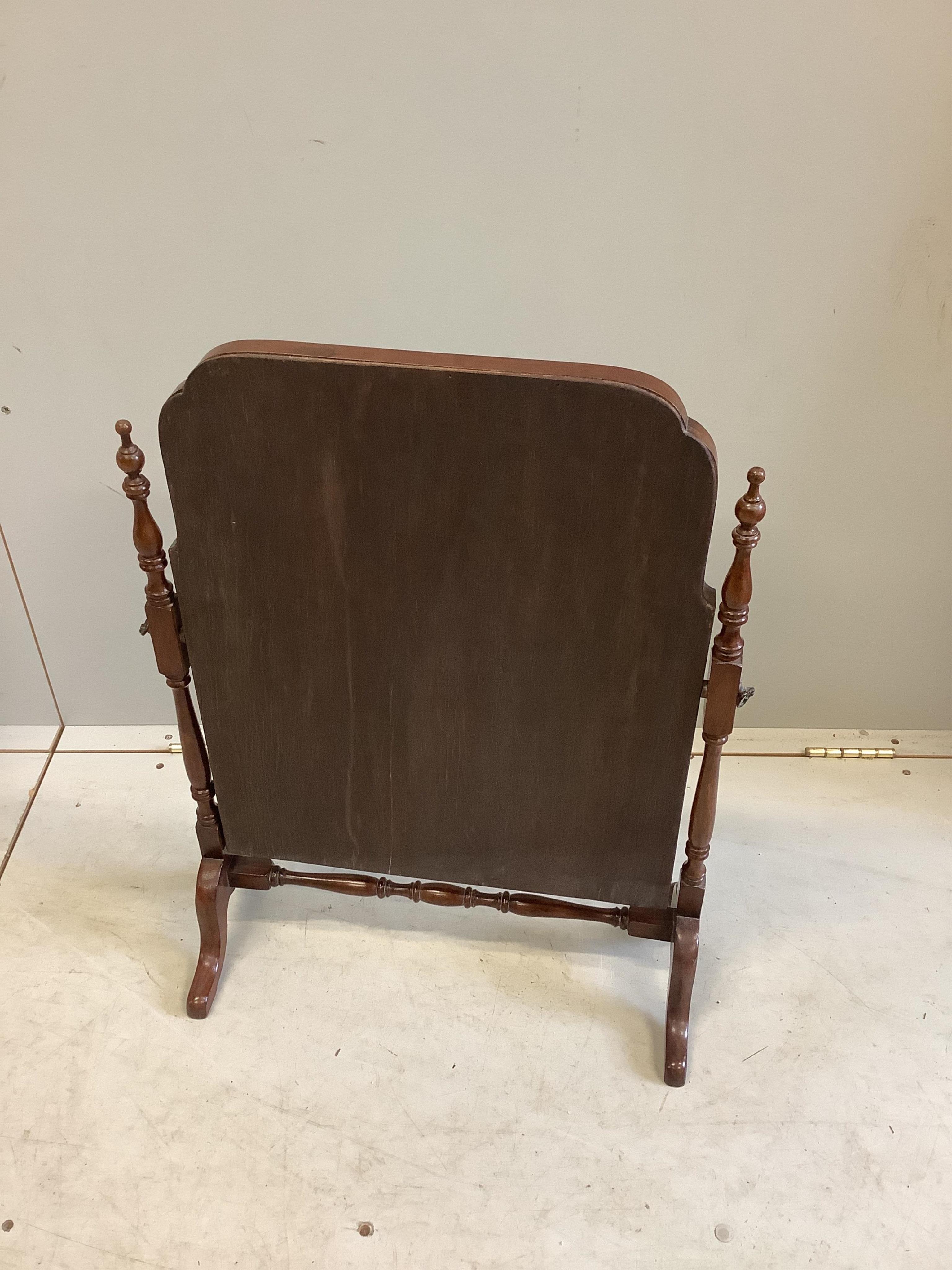 A George III style mahogany skeleton frame toilet mirror, width 52cm, height 68cm. Condition - good